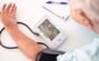mature person measures blood pressure with digital 2026 03 11 00 53 00 utc
