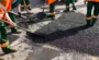 workers on asphalting paver machine during road st 2026 03 17 09 01 10 utc 1