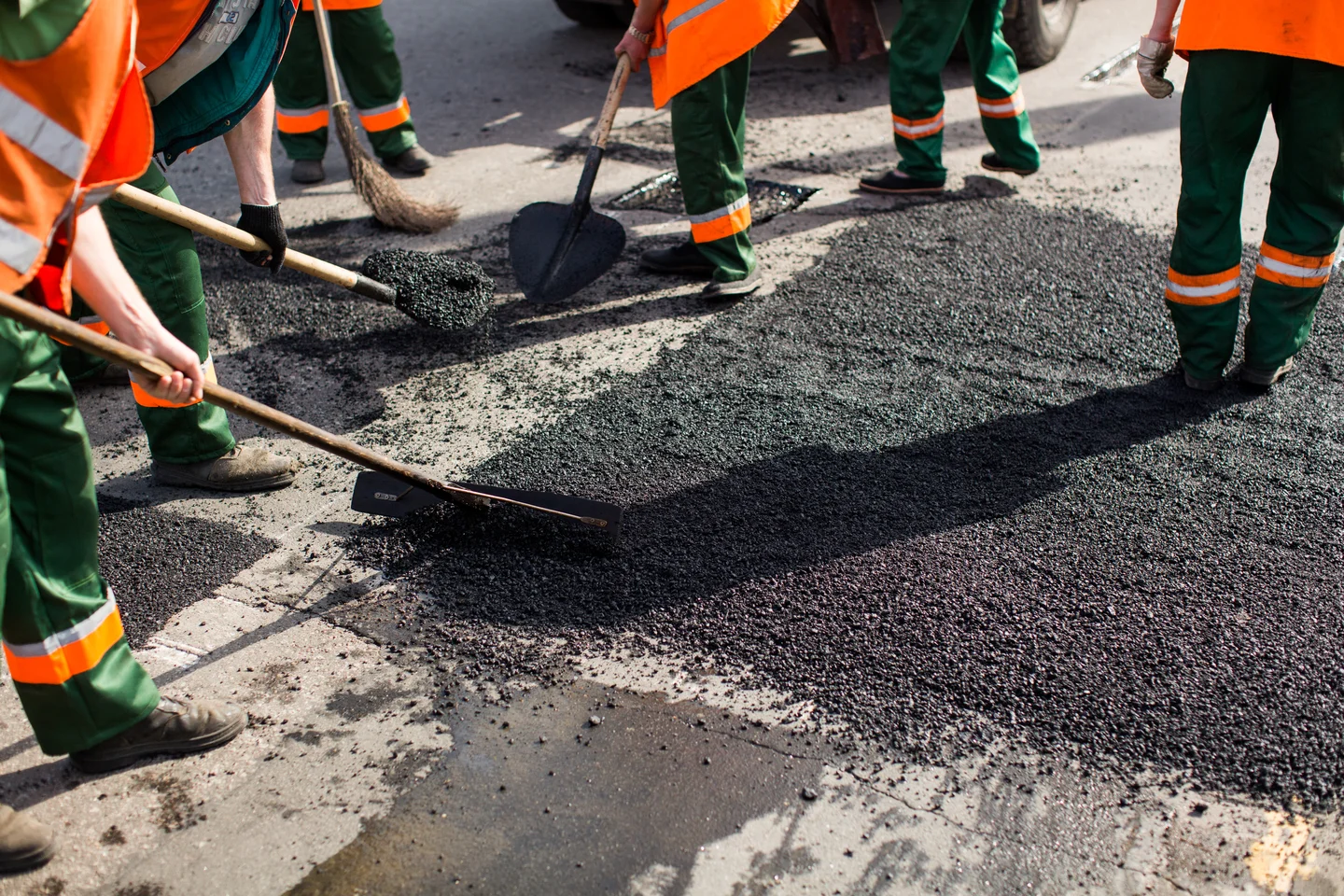 workers on asphalting paver machine during road st 2026 03 17 09 01 10 utc 1